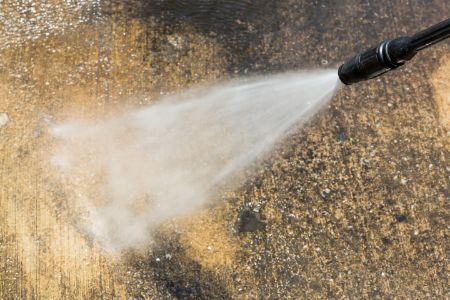 Concrete Cleaning: How to Remove Black Algae Without Etching Your Driveway